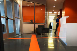 vinyl architectural graphics window glass installation perforated film